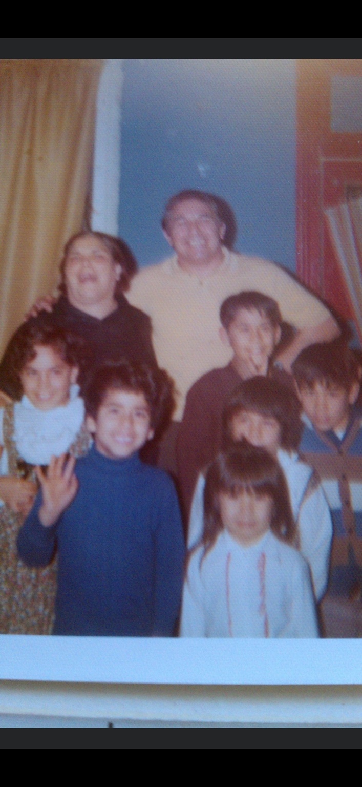 Family photograph featuring Joe V. Murillo with relatives