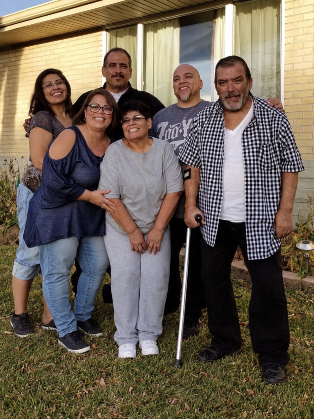 Family photograph featuring Joseph Edward Valdez with relatives